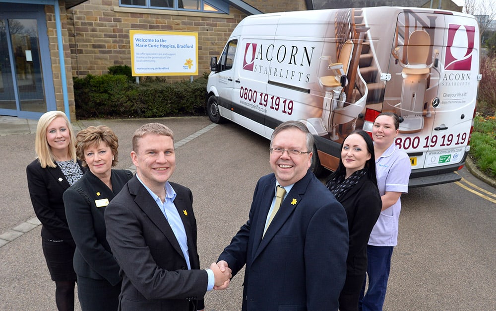 Acorn Stairlifts and Marie Curie partnership, Bradford. l-r Hayley Browning, Corporate Account Manager, Marie Curie: Christine Hamilton-Stewart MBE, Patron of Marie Curie: Peter Lee, Head of Corporate Development, Marie Curie: Dave Belmont, Company Secretary, Acorn Stairlifts:  Harriet Clay, Installation team, Acorn Stairlifts: Kathy Roebuck Healthcare Assistant. 20.01.16 Picture by Roger Moody / Guzelian