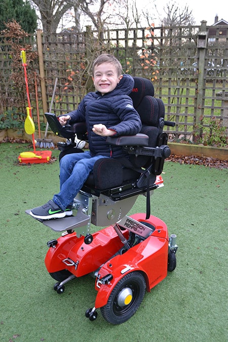 George Lockley with Precision Rehab Piccolino Paravan powerchair image