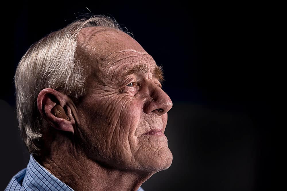 man with hearing aid image
