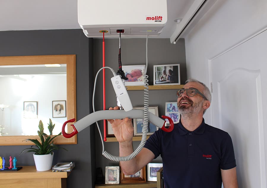 Colin Williams with a Molift hoist image