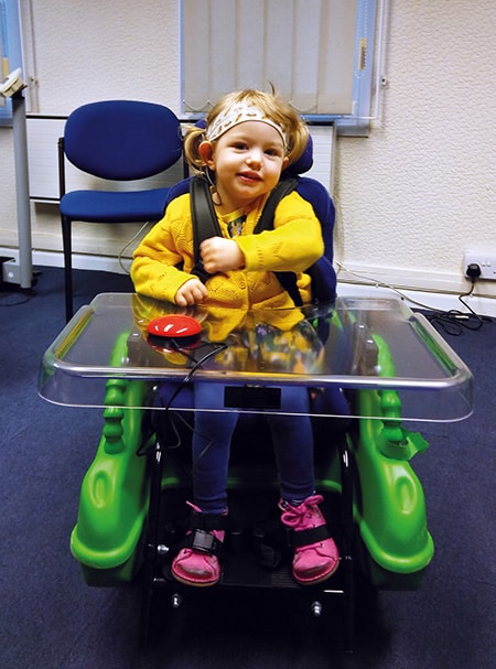 Olive with her Bugzi powerchair image