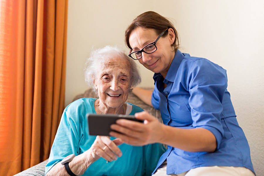 Older woman with carer image