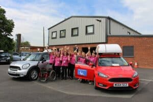 Derby DrivAbility in Pink shirts with 2 adapted vehicles