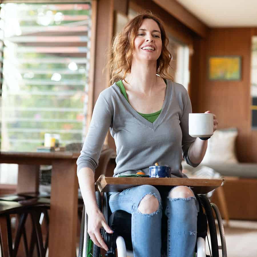wheelchair user with coffee image