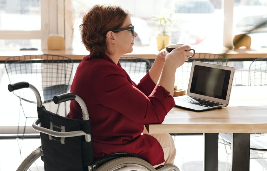 wheelchair user at work image